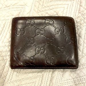 Mens Gucci wallet in dark brown